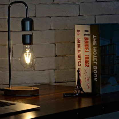 المصباح الكهربائي العائم مع شاحن هاتف لاسلكي - Makfool